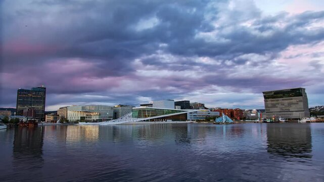 Dynamic Nightscape of Oslo Aker Brygge Blurred Crowds UHD Footage