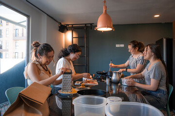 Women are in a modern kitchen talking and cooking, apartment meeting. The scene includes food preparation items.