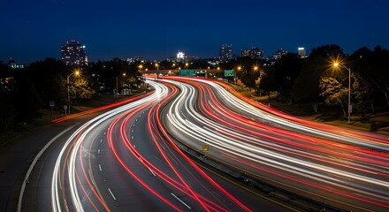 Traffic Flowing on Highway at Night with Light Trails