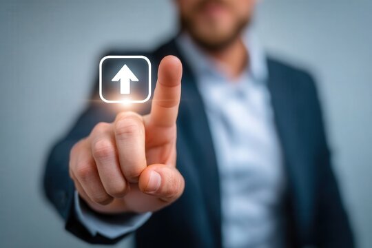 A businessman in a suit interacts with a visual digital interface, pressing an upward arrow icon on a touchscreen. The setting suggests a modern office environment during a professional meeting. - Powered by Adobe
