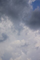 The sky is overcast with black clouds indicating that it will rain, creating a dramatic sky.
