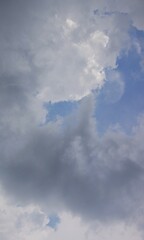 The sky is overcast with black clouds indicating that it will rain, creating a dramatic sky.

