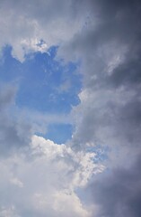 The sky is overcast with black clouds indicating that it will rain, creating a dramatic sky.