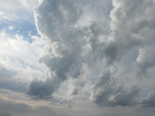 Cloudscape, cumulus clouds forming in the sky above Kent County, Delaware. Summer season. 
