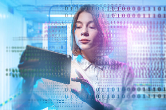 Woman working on tablet in data center with digital code overlay, representing cybersecurity, data processing, and IT analysis. – IT. Cybersecurity. Data Science.