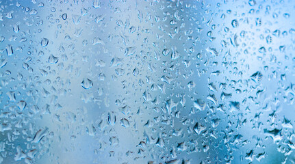 Abstract pattern of water drop on wind glass.