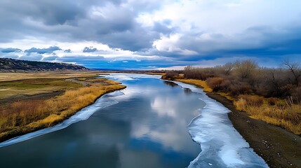 there is a large body of water that is frozen in the middle of a field