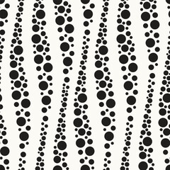 Vector seamless pattern. Dotted stylish background. Smooth waves with black circles. Elegant geometric swatch. Modern surface design.
