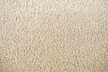 light woolen surface of sofas, armchairs and chairs