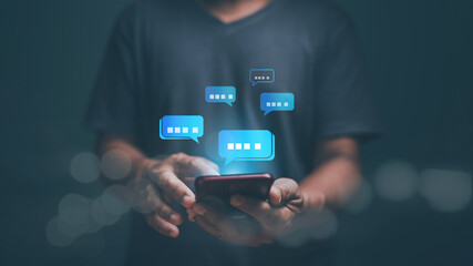 Digital online communication and social media concept, Businessman using application chat on smartphone for online marketing. Chatting to find information about products and services.