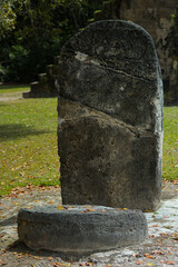 old stone cross in cemetery