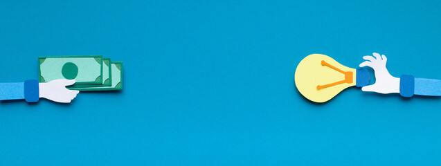 Crowdfunding concept. One paper hand giving dollars for fresh business idea, panorama, copy space