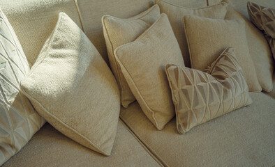 Pillows on a sofa, comfortable modern couch with many pillows