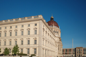 Obraz premium The Humboldt Forum situated along the Spree River on a sunny day in Berlin, Germany. 