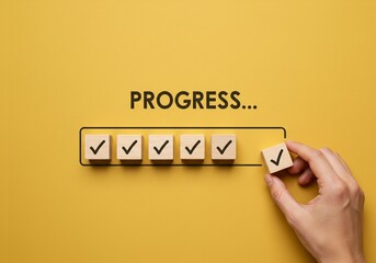 Checklist and task progress tracking concept. A hand placing the final checkmark on wooden blocks in a progress bar, task completion, productivity, goal setting, and efficient project management.