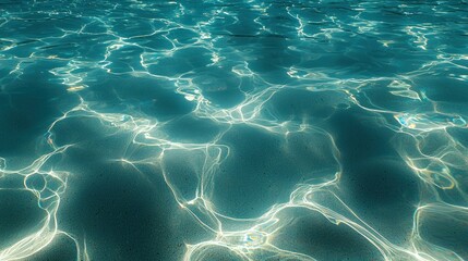 Fototapeta premium Sunlight dances through clear, turquoise water texture