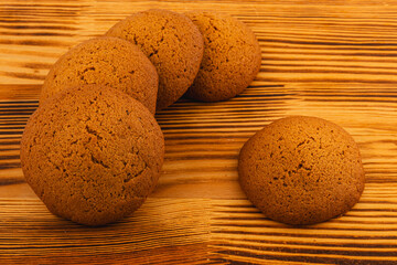 Freshly baked cookies on a wooden surface