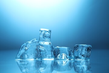 Cubes of clear ice on light blue background, closeup. Space for text