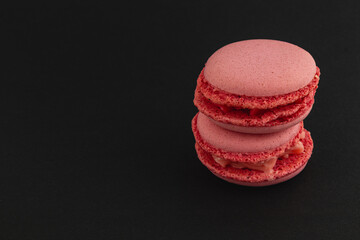 Delicious pink macarons stacked for a sweet treat