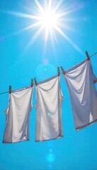 Freshly laundered clothes drying on a clothesline under a vibrant, clear blue sky The sun shines brightly, illuminating the clean laundry and creating a sense of purity and serenity , dry, vibrant