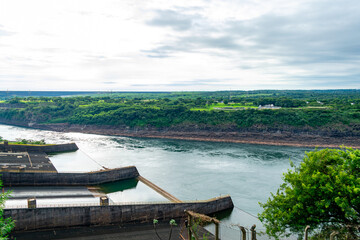 Obraz premium Small wooden boat on calm Iguazu River tropical Argentina