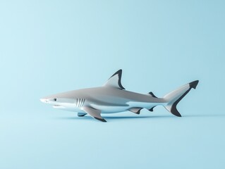 Shark figurine on serene blue backdrop