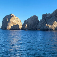 Cabo San Lucas Lands End From Boat Blue Sky with Sun and Shadows