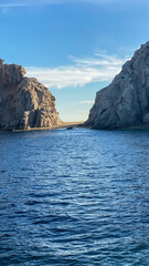 Cabo San Lucas Lands End From Boat Blue Sky with Sun and Shadows