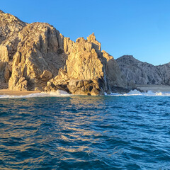 Cabo San Lucas Wave Crashing the Beach and Cliff Rocks from Boat on the Pacific Ocean