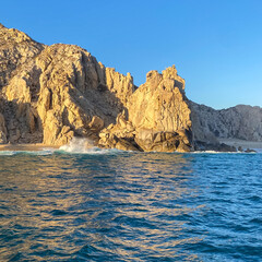 Cabo San Lucas Wave Crashing the Beach and Cliff Rocks from Boat on the Pacific Ocean