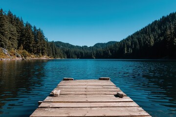 Obraz premium Peaceful Mountain Lake With Wooden Dock