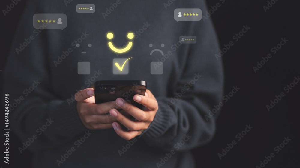 Aufkleber Female customer using a smartphone select a happy face icon on digital feedback. Concept of customer satisfaction, testimonial, online reviews, user feedback, review rankings and service quality.
