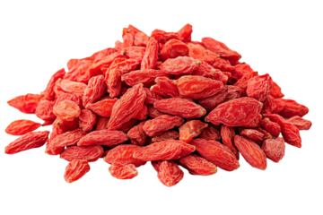 a pile of goji berries on a white surface