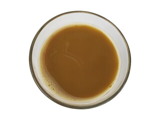 Top View of Transparent Glass Containing Fresh Brewed Coffee or Tea Beverage on White Background