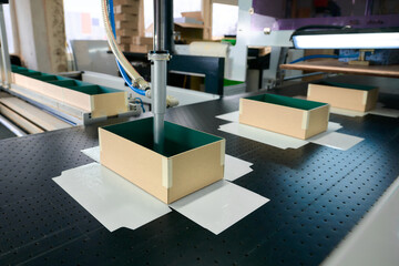 Innovative robots streamline box production at a decorative packaging factory