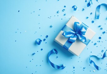 A light-blue gift box with a blue ribbon and confetti
