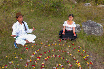 Traditional ritual with colorful flower arrangement