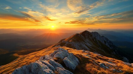 Fototapeta premium Breathtaking Sunset from Mountain Peak with Golden Hues