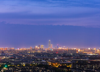 Blue hour night view of Ningbo Center Tower, Eastern New Town, Ningbo City, Zhejiang Province, China