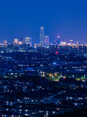 Blue hour night view of Ningbo Center Tower, Eastern New Town, Ningbo City, Zhejiang Province, China