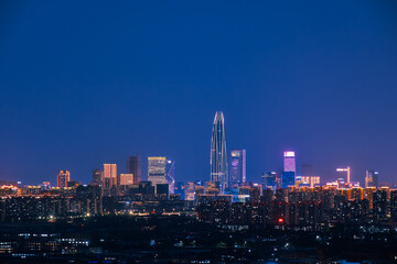 Obraz premium Blue hour night view of Ningbo Center Tower, Eastern New Town, Ningbo City, Zhejiang Province, China