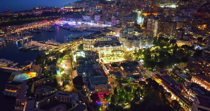 Aerial view of city centre of Monaco with night lights. France 