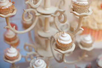 Intricately Decorated Cupcakes On Ornate Stand For Special Event