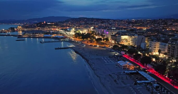 Aerial video in Cannes with a view at night. Prestigious nightlife in Cannes. Cannes, Cote Azur, French Riviera