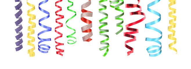 Bright serpentine streamers on white background. Party decor