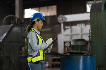 Worker, engineer woman, factory or storage warehouse. Electrician and engineer worker working or...