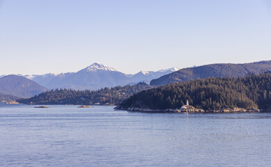 Scenic View of Lighthouse and Mountains in West Vancouver at Morning