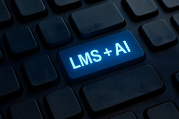 LMS and AI key glowing on keyboard, symbolizing technology and innovation