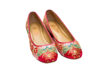 PNG Vibrant traditional embroidered red juttis with floral patterns and golden details