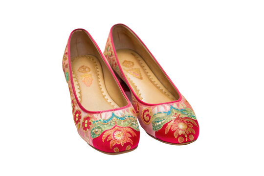 PNG Vibrant traditional embroidered red juttis with floral patterns and golden details